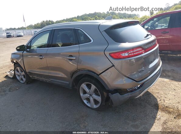 5LMCJ1C94HUL55339 2017 LINCOLN MKC Silver Trasero izquierdo