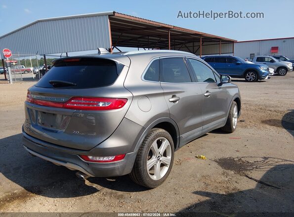 5LMCJ1C94HUL55339 2017 LINCOLN MKC Silver Trasero derecho