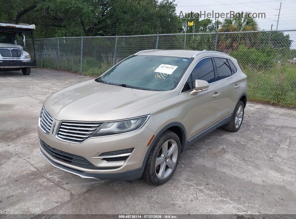 5LMCJ1C96HUL70358 2017 LINCOLN MKC Beige Vista tres cuartos delantera izquierda