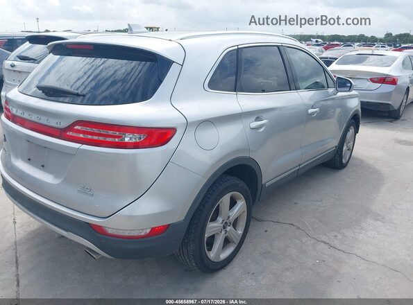 5LMCJ1C97GUJ28483 2016 LINCOLN MKC Silver უკანა მარჯვენა