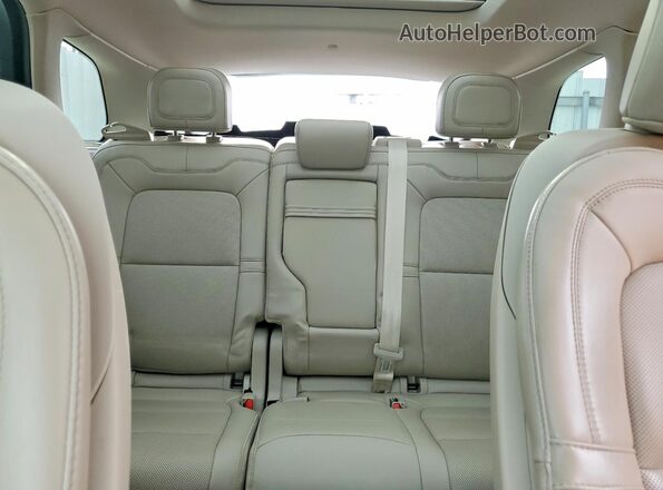 5LMCJ1CA4PUL04559 2023 LINCOLN CORSAIR White Vista de los asientos traseros