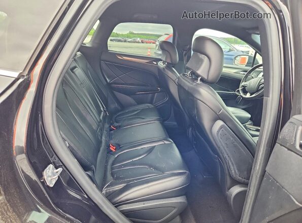 5LMCJ1D90KUL06984 2019 LINCOLN MKC Black Rear seats view