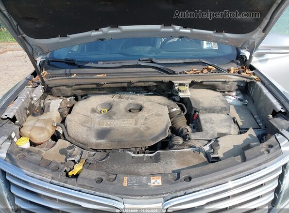 5LMCJ1D97GUJ21693 2016 LINCOLN MKC Silver Rear view