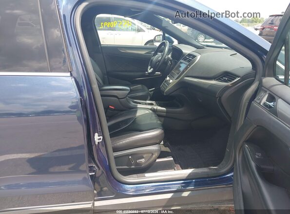 5LMCJ1D99HUL27275 2017 LINCOLN MKC Blue Front interior view