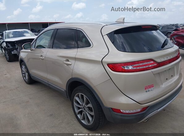 5LMCJ2C90HUL14387 2017 LINCOLN MKC Gold უკანა მარცხენა