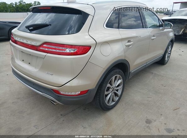 5LMCJ2C90HUL14387 2017 LINCOLN MKC Gold უკანა მარჯვენა