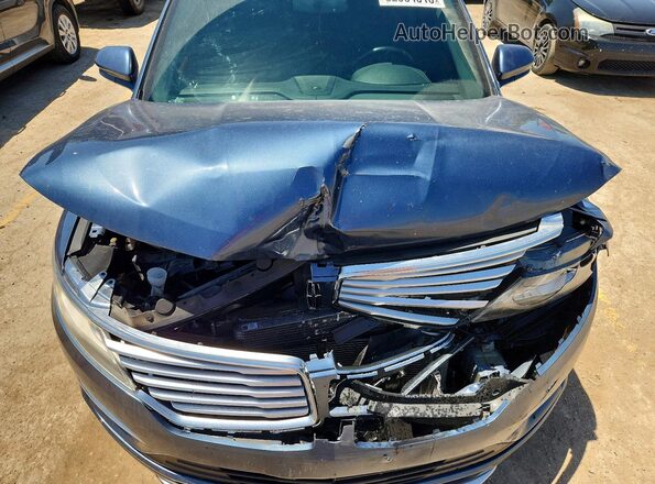 5LMCJ2C90JUL07512 2018 LINCOLN MKC Blue Սալոնի հետևի տեսք