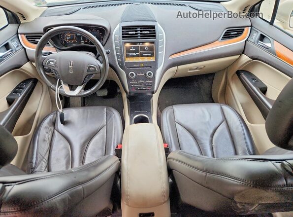 5LMCJ2C91HUL12499 2017 LINCOLN MKC Желто-коричневый Вид панели приборов