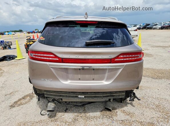 5LMCJ2C94KUL21320 2019 LINCOLN MKC Gray უკანა ხედი