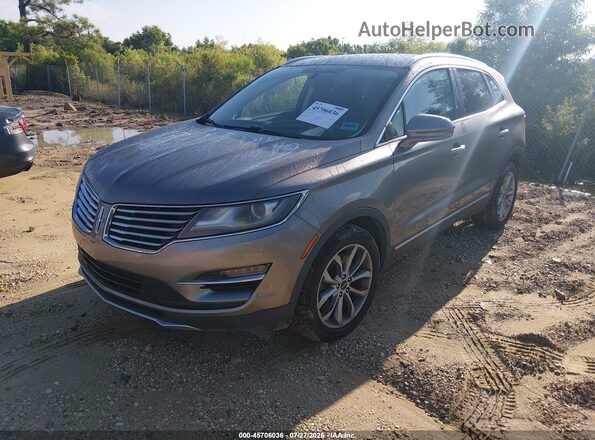 5LMCJ2C95GUJ21098 2016 LINCOLN MKC Gray Առջևի ձախ երեք քառորդ տեսարան