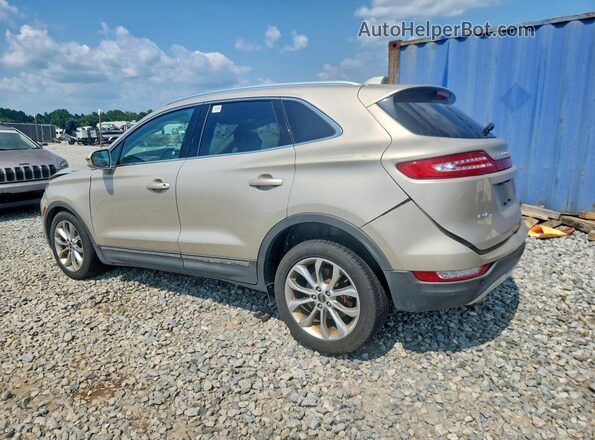 5LMCJ2C95HUL24073 2017 LINCOLN MKC Beige Trasero izquierdo