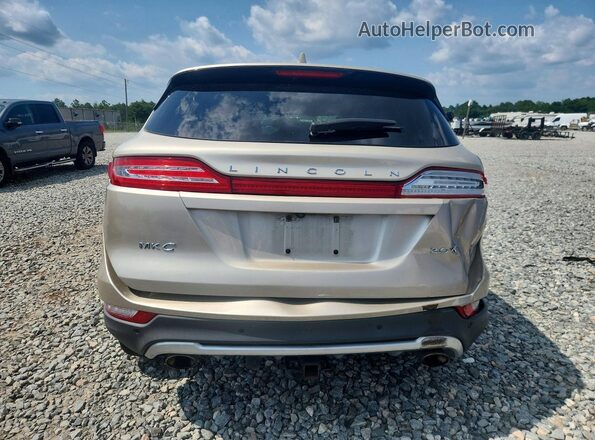 5LMCJ2C95HUL24073 2017 LINCOLN MKC Beige Vista trasera