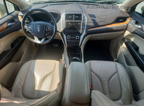 5LMCJ2C95HUL24073 2017 LINCOLN MKC Beige Vista del salpicadero