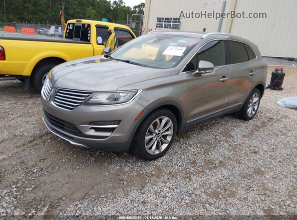 5LMCJ2C97GUJ27775 2016 LINCOLN MKC Brown წინა მარცხენა ხედი სამი მეოთხედიდან
