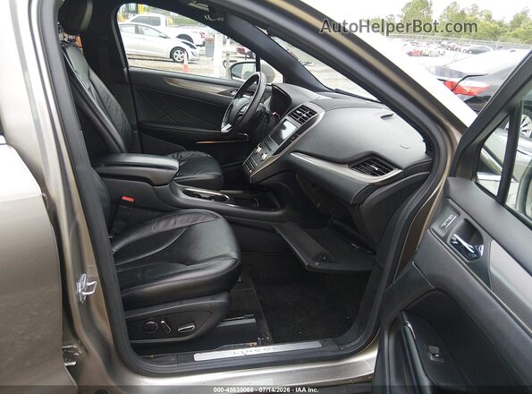 5LMCJ2C97GUJ27775 2016 LINCOLN MKC Brown წინა სალონის ხედი