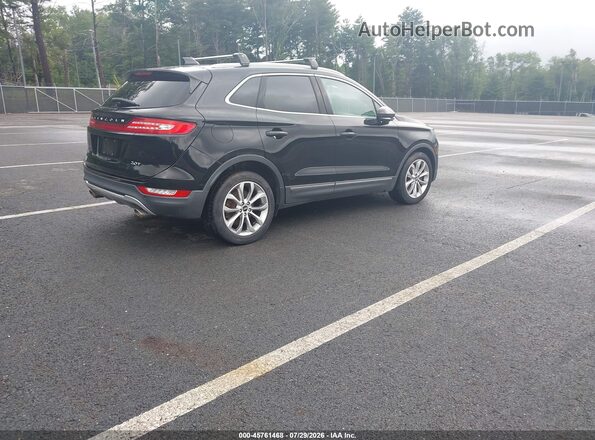 5LMCJ2C99HUL21600 2017 LINCOLN MKC Black Trasero derecho