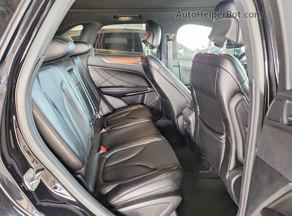 5LMCJ2C99HUL31351 2017 LINCOLN MKC Black Вид задньої частини салону
