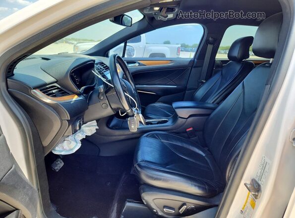 5LMCJ2C99JUL31176 2018 LINCOLN MKC White Vista interior delantera