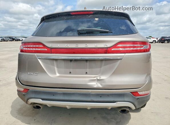 5LMCJ2C99KUL06893 2019 LINCOLN MKC Tan Հետևի տեսք