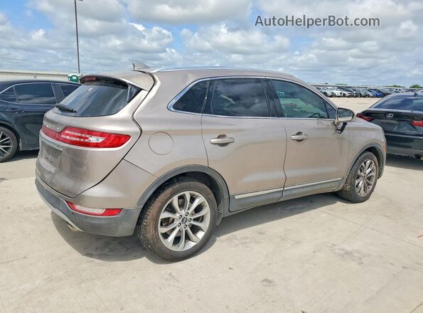 5LMCJ2C99KUL06893 2019 LINCOLN MKC Tan Հետևի աջ