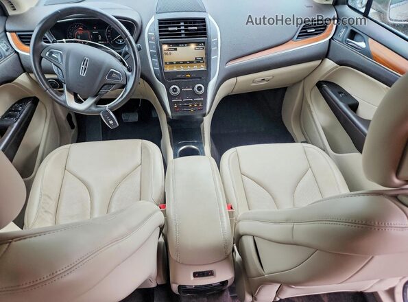 5LMCJ2D90JUL29881 2018 LINCOLN MKC Золотой Вид панели приборов