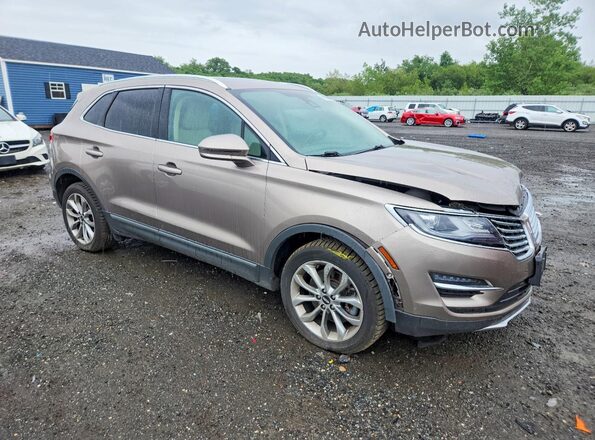 5LMCJ2D90JUL29881 2018 LINCOLN MKC Золотой Передняя правая четверть