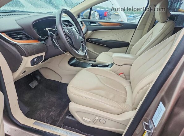 5LMCJ2D90JUL29881 2018 LINCOLN MKC Золотой Вид салона спереди