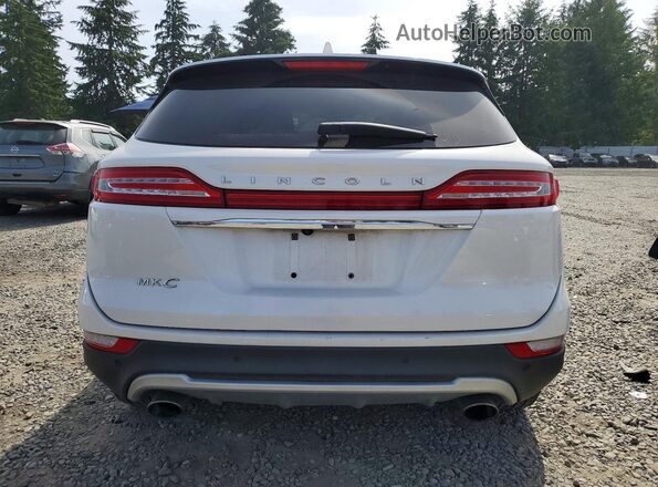 5LMCJ2D96KUL42930 2019 LINCOLN MKC White Widok z tyłu