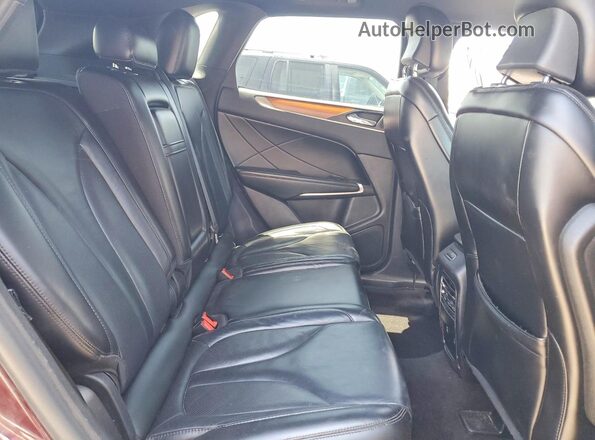 5LMCJ2D97KUL34089 2019 LINCOLN MKC Burgundy Widok wnętrza z tyłu