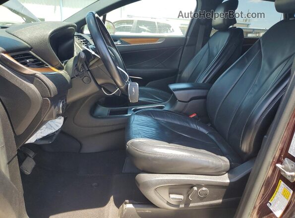 5LMCJ2D97KUL34089 2019 LINCOLN MKC Burgundy Widok wnętrza z przodu