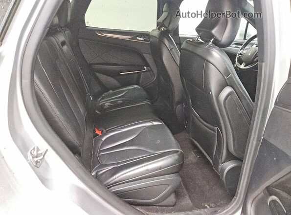 5LMCJ2D97KUL44296 2019 LINCOLN MKC Silver უკანა სავარძლების ხედი