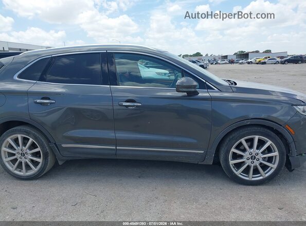 5LMCJ3C91KUL25945 2019 LINCOLN MKC Gray Вид задньої частини салону