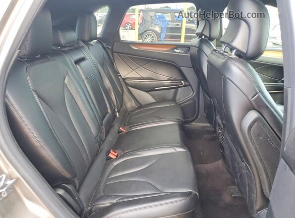 5LMCJ3C94HUL07674 2017 LINCOLN MKC Silver Vista interior trasera