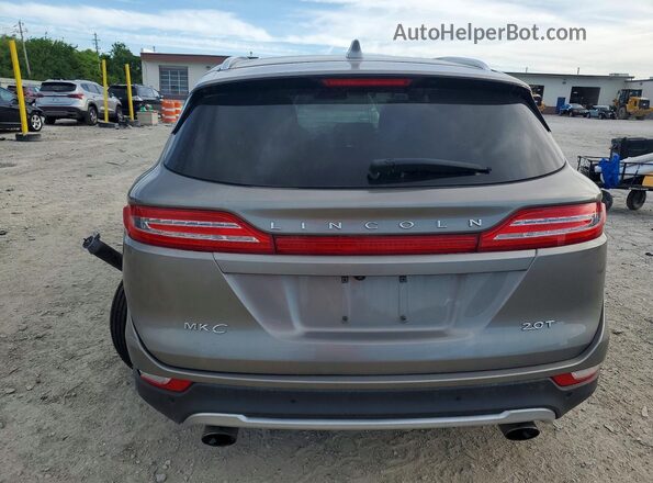 5LMCJ3C94HUL07674 2017 LINCOLN MKC Silver Vista trasera