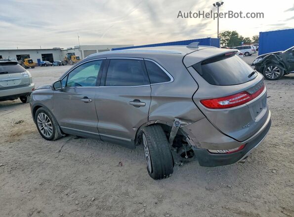 5LMCJ3C94HUL07674 2017 LINCOLN MKC Silver Trasero izquierdo