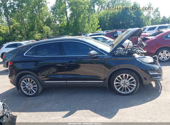 5LMCJ3C96HUL08535 2017 LINCOLN MKC Black Vista interior trasera