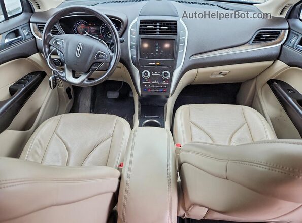 5LMCJ3C97KUL15565 2019 LINCOLN MKC Tan Вид панелі приладів