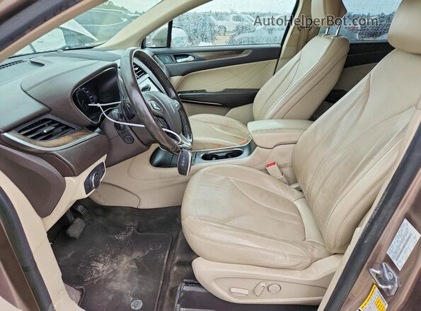5LMCJ3C97KUL15565 2019 LINCOLN MKC Tan Вид салону спереду