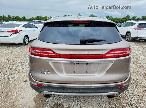 5LMCJ3C97KUL15565 2019 LINCOLN MKC Tan Вид ззаду