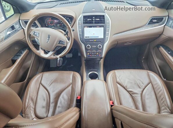 5LMCJ3C99HUL32067 2017 LINCOLN MKC White Dashboard view