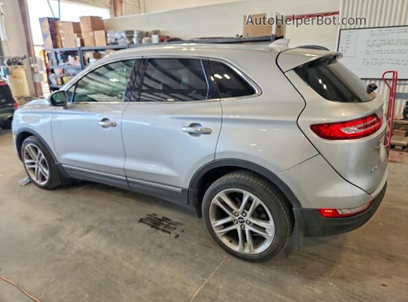 5LMCJ3D93KUL22446 2019 LINCOLN MKC Silver Rear left