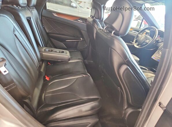 5LMCJ3D93KUL22446 2019 LINCOLN MKC Silver Rear seats view