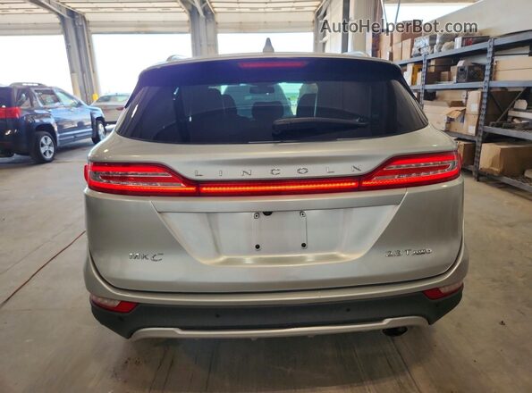 5LMCJ3D93KUL22446 2019 LINCOLN MKC Silver Rear view