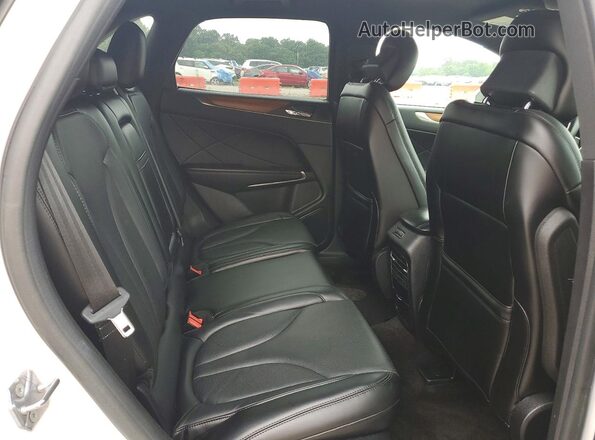5LMCJ3D96GUJ12690 2016 LINCOLN MKC White Vista interior trasera