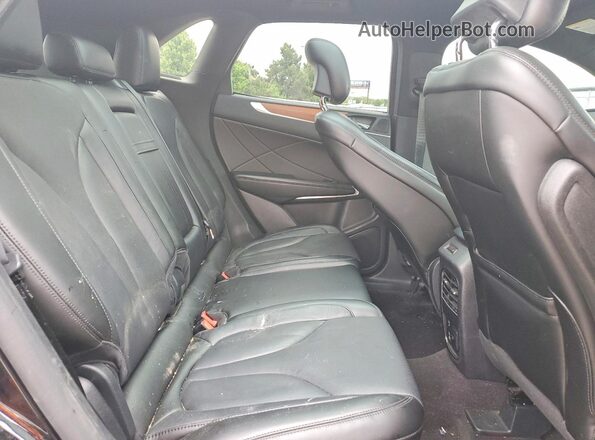 5LMCJ3D96KUL44747 2019 LINCOLN MKC Black Widok wnętrza z tyłu