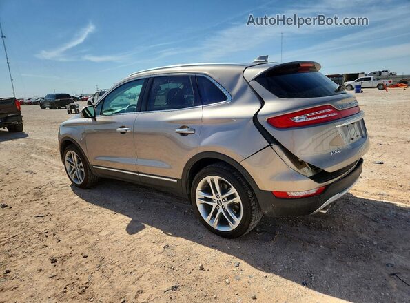 5LMCJ3D9XKUL25862 2019 LINCOLN MKC Gold Հետևի ձախ