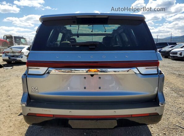 5LMJJ2LG6REL05114 2024 LINCOLN NAVIGATOR Silver Rear view