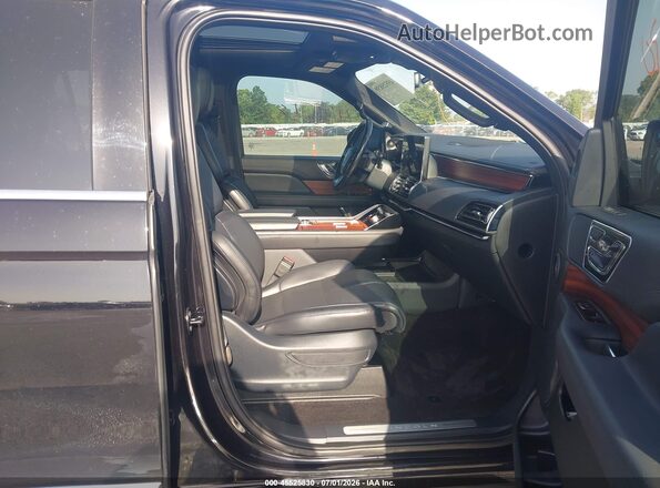 5LMJJ2LG6REL21510 2024 LINCOLN NAVIGATOR Черный Вид салона спереди
