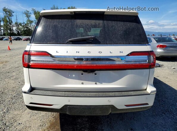 5LMJJ2LT3KEL09916 2019 LINCOLN NAVIGATOR Кремовый Вид сзади