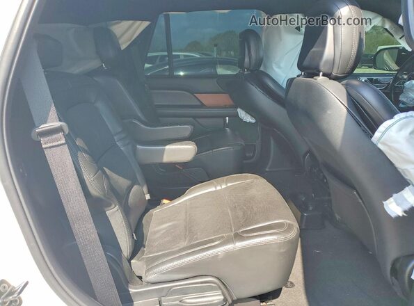 5LMJJ2NT8LEL09764 2020 LINCOLN NAVIGATOR Белый Вид задней части салона